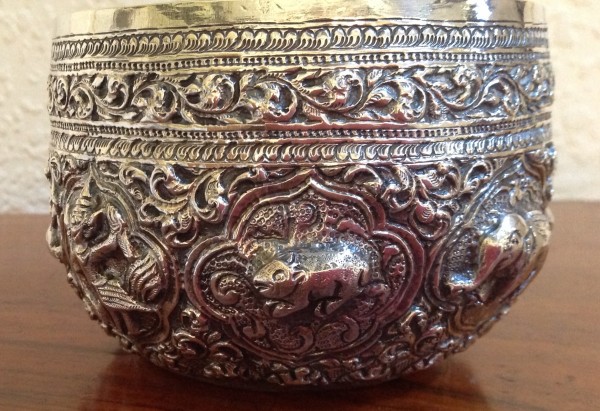 Antique silver libation bowl with the animals of the zodiac. Burma, 1890-1910
